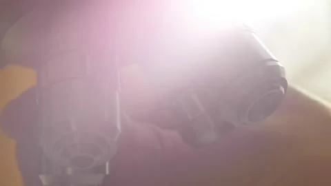 A scientist uses a microscope in the laboratory. Stock Footage 220337931