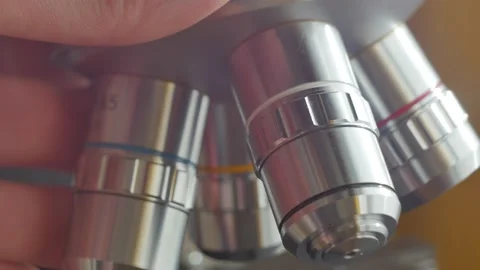 A scientist uses a microscope in the laboratory. Stock Footage 220338051