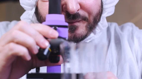 Scientist uses microscope for scientific research. Ecology biological experiment 스톡 동영상 122765132
