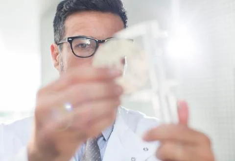 Scientist using caliper Stock Photos