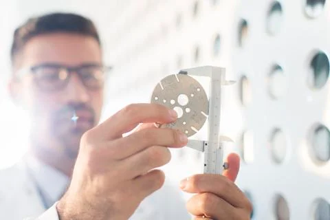Scientist using calipers Stock Photos