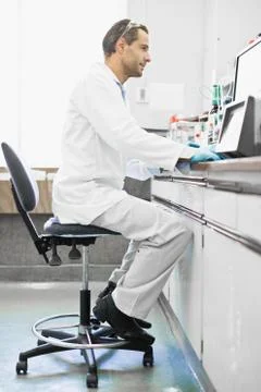 Scientist using computer in lab 스톡 사진