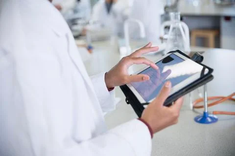Scientist using digital tablet in laboratory Foto stock