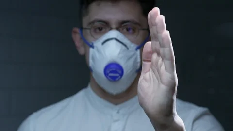 Scientist using hand sanitizer alcohol spray Stock Footage 126357195