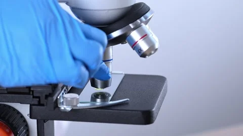 Scientist using laboratory microscope. Stock Footage 270757745