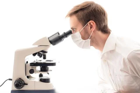 Scientist using microscope 库存照片