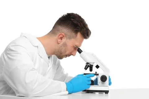 Scientist using modern microscope at table isolated on white. Medical researc Stock Photos