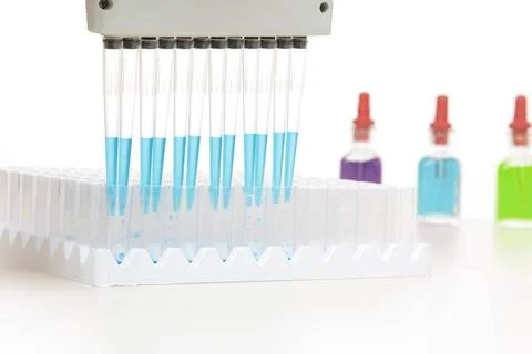  Scientist using pipette in research Pipette releases a programmed amount ... Stock Photos