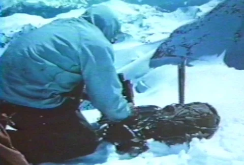 Scientist using a survey instrument on the Blue Glacier. Stock Footage 122211928