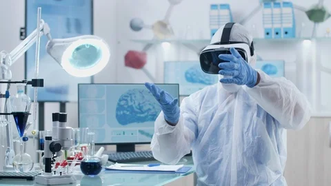 Scientist using virtual reality in modern and high end research center Stock Footage 108742393