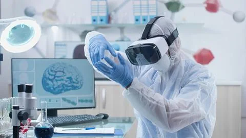 Scientist using vr headset in lab Stock Photos