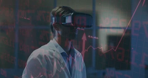 Scientist in VR headset pointing, causing red financial holograms to spike Stock Footage 330444244