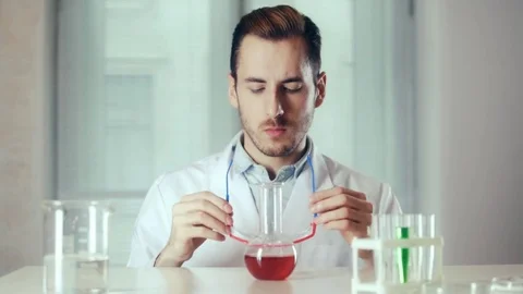 Scientist wearing protective eyewear Video stock 73111127