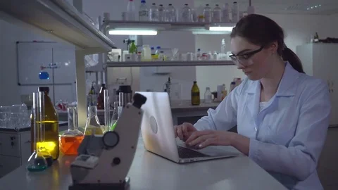 Scientist wearing in white coat Stock Footage 73265006