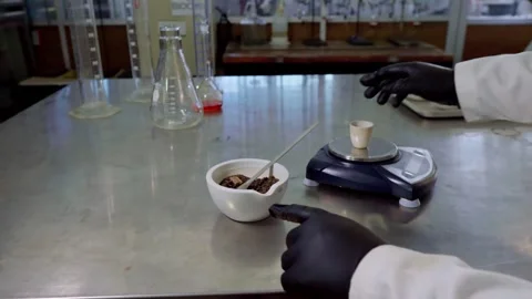 Scientist Weighing Soil Sample in Laboratory for Agronomical Analysis Stock Footage 346623058