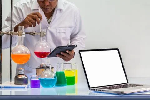 A scientist work on computer in lab with copy space Foto stock