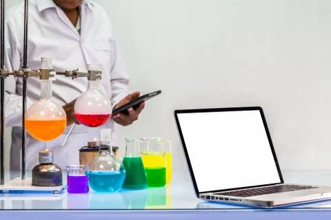 A scientist work on computer in lab with copy space Stock Photos