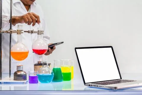 A scientist work on computer in lab with copy space Foto stock