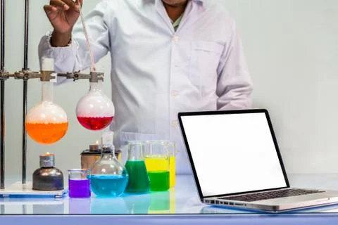 A scientist work on computer in lab with copy space Foto stock