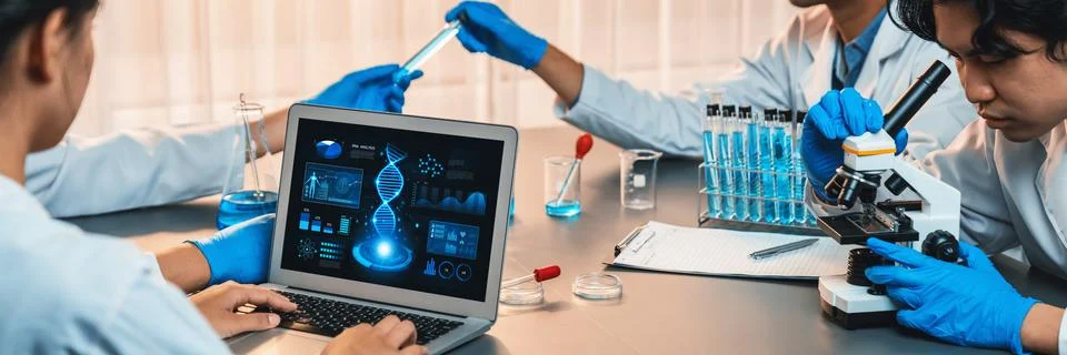 Scientist working on biotechnology computer software to study DNA. Neoteric Stock Photos
