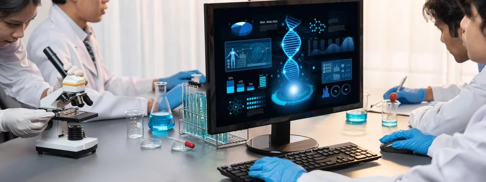 Scientist working on biotechnology computer software to study DNA. Neoteric Stock-Fotos