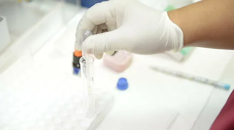 Scientist working at the blood laboratory Stock Footage 43370603