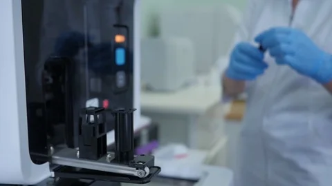 Scientist working with blood samples probes at modern lab equipment technolo Stock Footage 123574569
