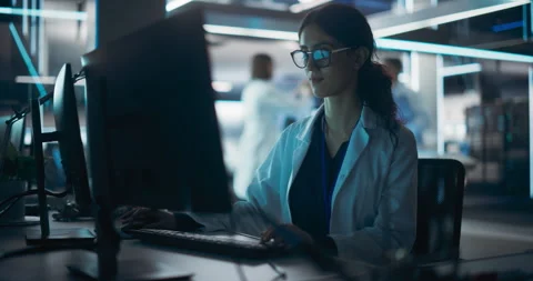 Scientist Working on Computer Stock Footage 243562613