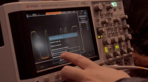 Scientist working with an electronic measuring device and see the results Stock Footage 68355497