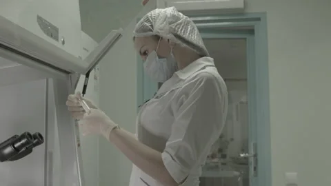 Scientist working in lab. Doctor analyzing, research Video stock 143160554