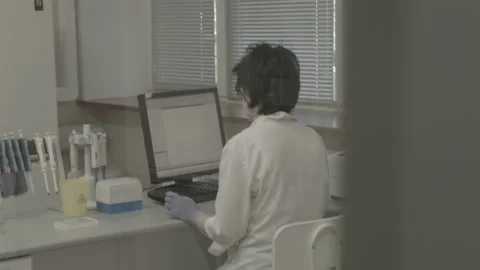 Scientist working in lab. Doctor analyzing, research Video stock 143160807