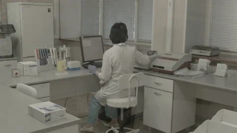 Scientist working in lab. Doctor analyzing, research Video stock 143160885