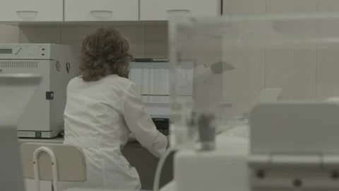 Scientist working in lab. Doctor analyzing, research Video stock 143160899