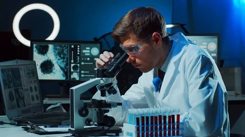 Scientist working in lab. Doctor making microbiology research. Laboratory tools Stock Footage 126951330