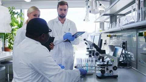 Scientist working in lab. Doctors making medical research. Laboratory tools Stock Footage 116384082