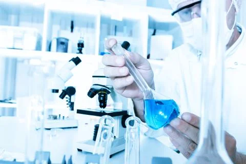 Scientist working in the lab a with liquid Foto stock