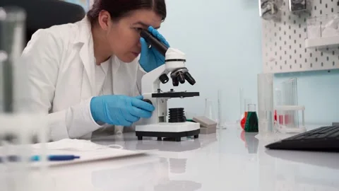 Scientist working in lab. Science, biotechnology, healthcare and chemistry Stock Footage 131309968