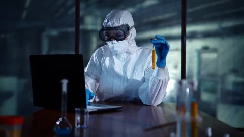 Scientist working in the laboratory with computer. High technology, using Stock Footage 95352445