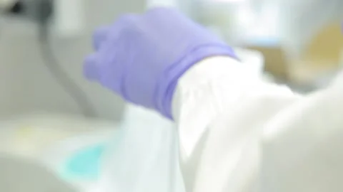 Scientist working in the laboratory with DNA and blood Stock Footage 136400516
