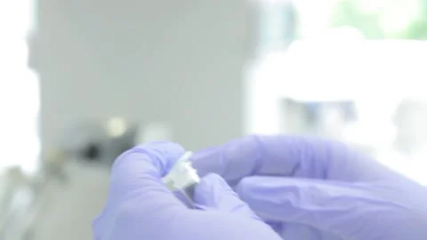 Scientist working in the laboratory with DNA and blood Stock Footage 136400735