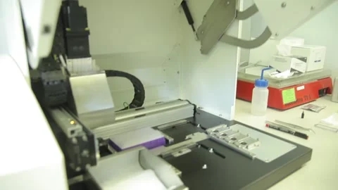Scientist working in the laboratory with DNA and blood Stock Footage 136401506