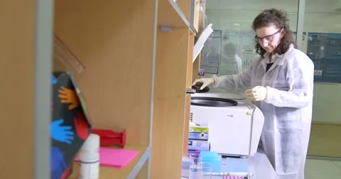 Scientist working at the laboratory Stock Footage 66745284
