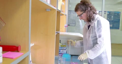 Scientist working at the laboratory Stock Footage 66745414