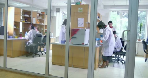 Scientist working at the laboratory Stock Footage 66745499