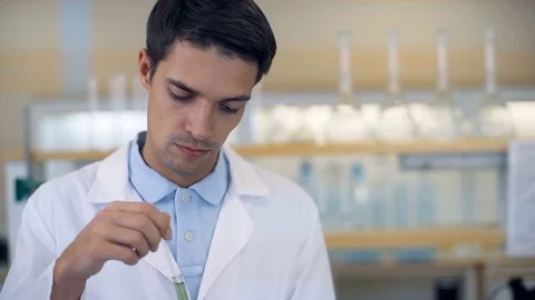 Scientist working at the laboratory Stock Footage 74938716