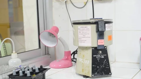 Scientist working in laboratory Stock Footage 75785874