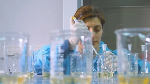 Scientist working at the laboratory Stock Footage 76256517