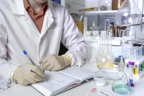 Scientist working with laboratory samples of nutritional supplements and maki Stock Photos