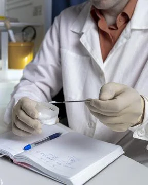 Scientist working with laboratory samples of nutritional supplements and maki Stock Photos