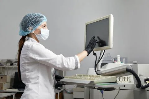 Scientist Working in Laboratory Using computer Screen Foto stock